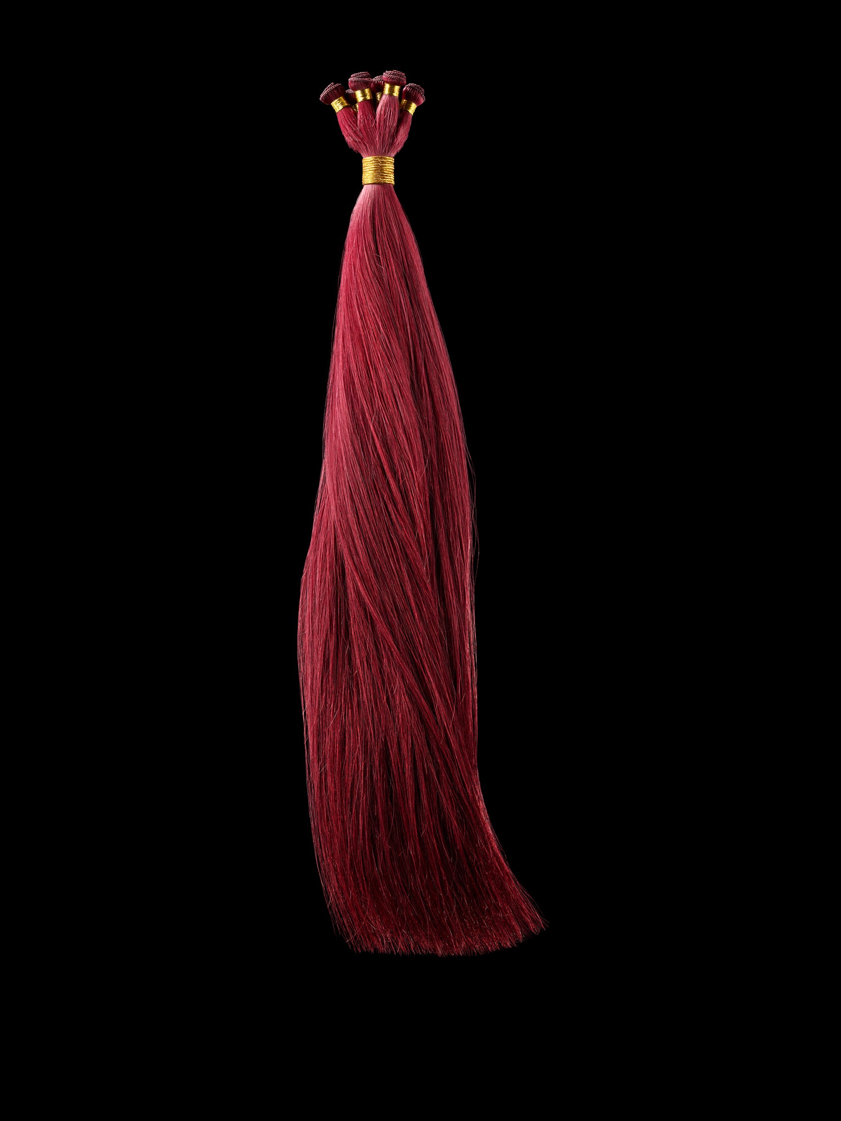 Full view of Everything Hand Tied's Classic Collection in Pomegrante Straight Hand Tied Hair Extensions